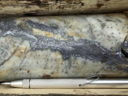 hole sr25-003 at 18m showing galena vein cutting quartzite with disseminated pyrite-arsenopyrite